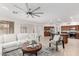 Spacious living room with an open layout and sightlines to the kitchen and dining areas at 3317 W Knudsen Dr, Phoenix, AZ 85027