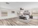 Spacious main bedroom with accent wall, ceiling fan, large windows, and lots of natural light at 3317 W Knudsen Dr, Phoenix, AZ 85027