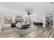 Spacious main bedroom with accent wall, ceiling fan, large windows, and lots of natural light at 3317 W Knudsen Dr, Phoenix, AZ 85027