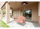 Covered patio features a hanging wooden swing and ceiling fans at 3317 W Knudsen Dr, Phoenix, AZ 85027