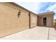 Open patio with stucco walls, outdoor lighting, and a sliding door at 3317 W Knudsen Dr, Phoenix, AZ 85027