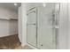 Bathroom featuring a glass-enclosed shower with silver hardware and a view into the walk-in closet at 3903 E French Trotter St, San Tan Valley, AZ 85140