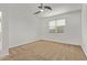 Bedroom with neutral carpet, ceiling fan, and a window with blinds at 3903 E French Trotter St, San Tan Valley, AZ 85140