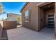 Inviting front entrance with neutral colors and a charming accent window at 3903 E French Trotter St, San Tan Valley, AZ 85140