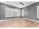 Empty bedroom showcasing neutral walls and plenty of natural light from the shutters at 4121 E Narrowleaf Dr, Gilbert, AZ 85298