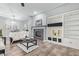 Cozy living room showcasing a fireplace, built-in shelving, and comfortable seating at 4121 E Narrowleaf Dr, Gilbert, AZ 85298