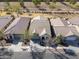 Aerial view of the house in a neighborhood, displaying the roofline, street, and surrounding landscape at 4135 E Cathy Dr, Gilbert, AZ 85296