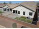 Aerial view of home highlighting the backyard with artificial turf and pavers, and attached garage at 4135 E Cathy Dr, Gilbert, AZ 85296