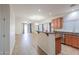 Open-concept kitchen featuring granite countertops overlooking the dining area and backyard at 4135 E Cathy Dr, Gilbert, AZ 85296