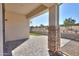 Covered patio features stone columns and brick flooring offering nice views at 4135 E Cathy Dr, Gilbert, AZ 85296