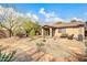 Spacious backyard with desert landscaping, stone pathways, and private patio, creating a tranquil outdoor oasis at 4533 E Coyote Wash Dr, Cave Creek, AZ 85331