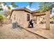 Backyard featuring a covered patio with grill and seating, perfect for outdoor cooking and entertaining at 4533 E Coyote Wash Dr, Cave Creek, AZ 85331