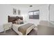 Well lit bedroom featuring a brown headboard and neutral decor at 4533 E Coyote Wash Dr, Cave Creek, AZ 85331