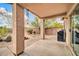 Comfortable covered patio with barbecue and views of the serene desert landscape perfect for outdoor dining at 4533 E Coyote Wash Dr, Cave Creek, AZ 85331