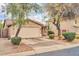 Charming single-story home featuring a two-car garage and desert landscaping at 4533 E Coyote Wash Dr, Cave Creek, AZ 85331