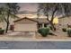 Charming single-story home featuring a two-car garage and desert landscaping at 4533 E Coyote Wash Dr, Cave Creek, AZ 85331