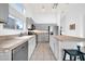 Modern kitchen with gray cabinetry and a large island at 4533 E Coyote Wash Dr, Cave Creek, AZ 85331