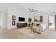 Open concept living room featuring light wood floors and neutral color palette at 5819 E Ludlow Dr, Scottsdale, AZ 85254