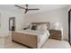 Relaxing main bedroom with a neutral color palette and ensuite bathroom at 5819 E Ludlow Dr, Scottsdale, AZ 85254