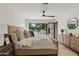 Inviting main bedroom with a neutral color palette and view of the backyard at 5819 E Ludlow Dr, Scottsdale, AZ 85254