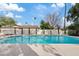 Sparkling pool area with lush landscaping, privacy wall, and inviting cool blue water, perfect for relaxation and enjoyment at 5819 E Ludlow Dr, Scottsdale, AZ 85254