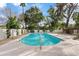 Inviting pool featuring cool, refreshing water and surrounded by beautiful greenery and a spacious patio area for outdoor entertaining at 5819 E Ludlow Dr, Scottsdale, AZ 85254