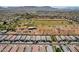 Panoramic aerial view of the community, highlighting its proximity to surrounding neighborhoods and open areas at 6648 S 27Th Ave, Phoenix, AZ 85041