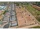 Extensive property with a combination of open land and adjacent residential area shown in this aerial image at 6648 S 27Th Ave, Phoenix, AZ 85041