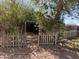 A wooden gate entrance to the backyard, leading to the dog run at 6834 E Culver St, Mesa, AZ 85207