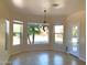 Cozy dining room with tile floors, natural light and backyard views at 6834 E Culver St, Mesa, AZ 85207