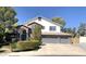 Charming two-story home features a three-car garage, brick accents, and mature landscaping at 6834 E Culver St, Mesa, AZ 85207