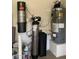 A utility room featuring a water heater and filtration system at 6834 E Culver St, Mesa, AZ 85207