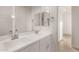 Bathroom features a double sink vanity and a large mirror at 717 E Deer Creek Rd, Phoenix, AZ 85048