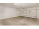 Spacious garage with a large, white door at 717 E Deer Creek Rd, Phoenix, AZ 85048