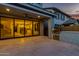 Covered patio with built in grill, exterior ceiling fan, and sliding glass doors at 717 E Deer Creek Rd, Phoenix, AZ 85048