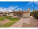 Cozy backyard featuring a grass, patio cover, and paver walkway at 812 W Rosal Pl, Chandler, AZ 85225