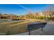 Beautiful community park featuring walking paths, benches, mature trees, and well-maintained landscaping at 919 S Pheasant Dr, Gilbert, AZ 85296