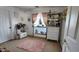 Bright bedroom featuring neutral carpet, decor, and a window with natural light at 9335 W Kingman St, Tolleson, AZ 85353