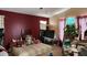 Bedroom featuring a bed with dark furniture, decor, and a window with natural light at 9335 W Kingman St, Tolleson, AZ 85353