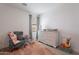 Cozy bedroom with plush chair, colorful toys, and soft pink rug at 9918 E Tahoe Ave, Mesa, AZ 85212