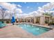 Community pool offering a lift, lounge chairs, and privacy with shade cabanas, great for community gatherings at 9918 E Tahoe Ave, Mesa, AZ 85212