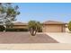 Charming single-story home featuring low-maintenance landscaping and a two-car garage at 9946 W Willow Creek Cir, Sun City, AZ 85373