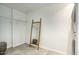 A walk-in closet featuring wire shelving and a leaning mirror at 120 E Coronado Rd # 9, Phoenix, AZ 85004