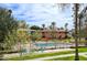 A community pool surrounded by mature trees and grassy areas is perfect for enjoying the outdoors at 120 E Coronado Rd # 9, Phoenix, AZ 85004