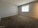 Neutral bedroom with plush carpeting, offering comfort and a relaxing atmosphere at 1210 E Marny Rd, Tempe, AZ 85288