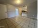 Dining area featuring tile flooring and an open view into the kitchen at 1210 E Marny Rd, Tempe, AZ 85288