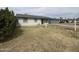 View of the front yard with gravel landscaping and a white bird bath at 1210 E Marny Rd, Tempe, AZ 85288