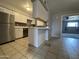 Kitchen featuring updated appliances and modern white cabinetry at 1210 E Marny Rd, Tempe, AZ 85288