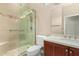 Renovated bathroom featuring a glass shower and modern vanity at 12852 W El Sueno Dr, Sun City West, AZ 85375