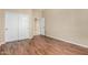 Bedroom with hardwood floors and closet at 12852 W El Sueno Dr, Sun City West, AZ 85375